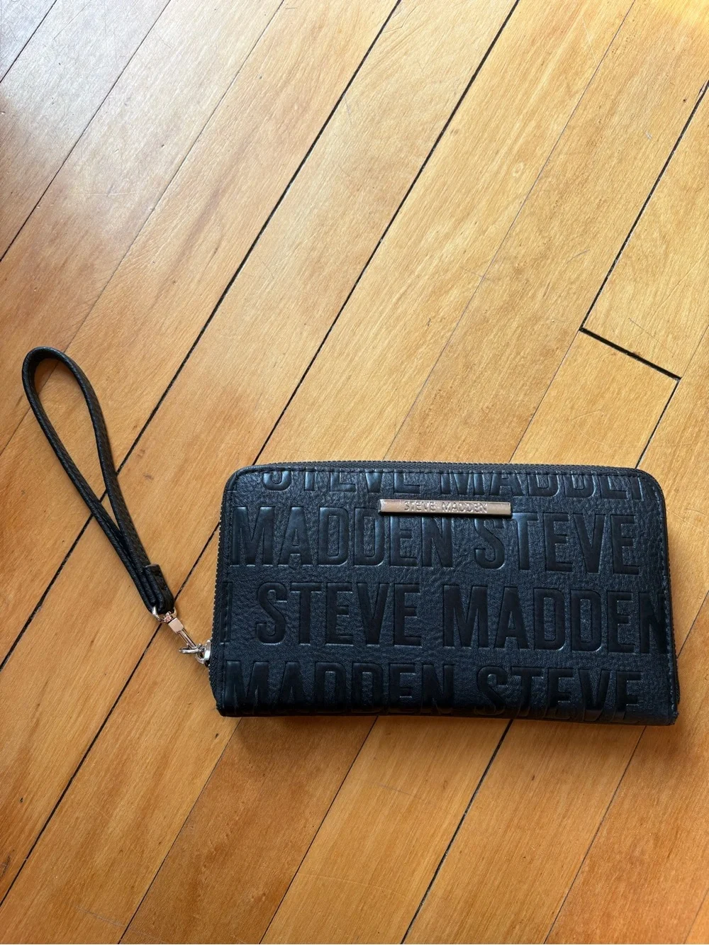 Steve Madden Black Embossed Logo Wristlet